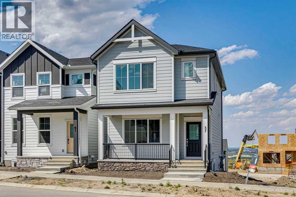 37 Bluerock Hill SW, Calgary, Alberta  T2Y 0V8 - Photo 2 - A2332885