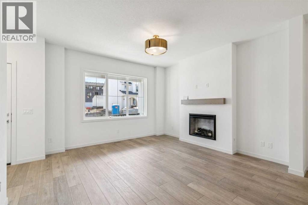 37 Bluerock Hill SW, Calgary, Alberta  T2Y 0V8 - Photo 4 - A2332885