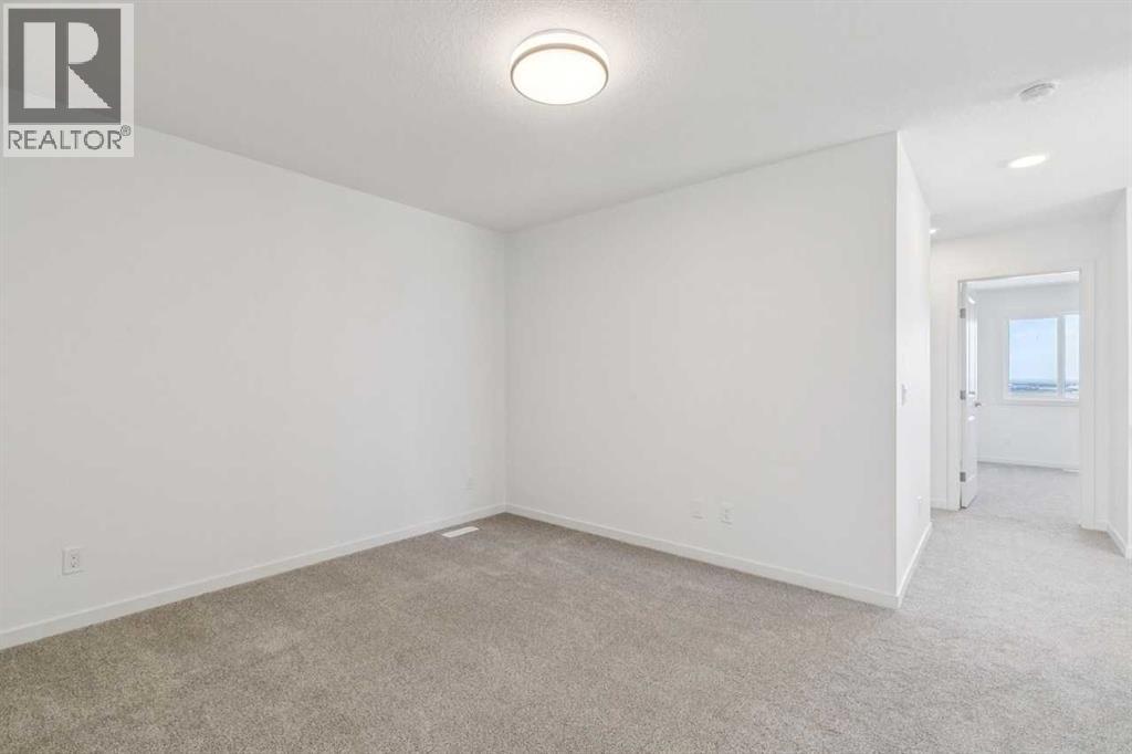 37 Bluerock Hill SW, Calgary, Alberta  T2Y 0V8 - Photo 20 - A2332885