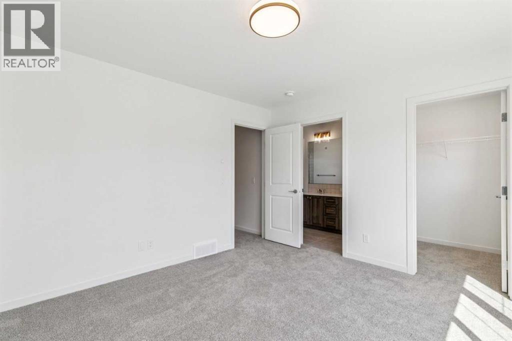37 Bluerock Hill SW, Calgary, Alberta  T2Y 0V8 - Photo 23 - A2332885