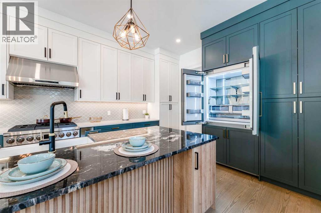 812 1 Street NW, Calgary, Alberta  T2M 2R7 - Photo 11 - A2334040
