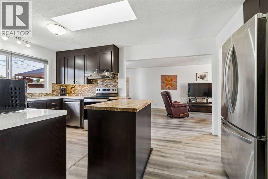 5635 Travis Crescent NE, Calgary, Alberta  T2K 3W1 - Photo 12 - A2335001