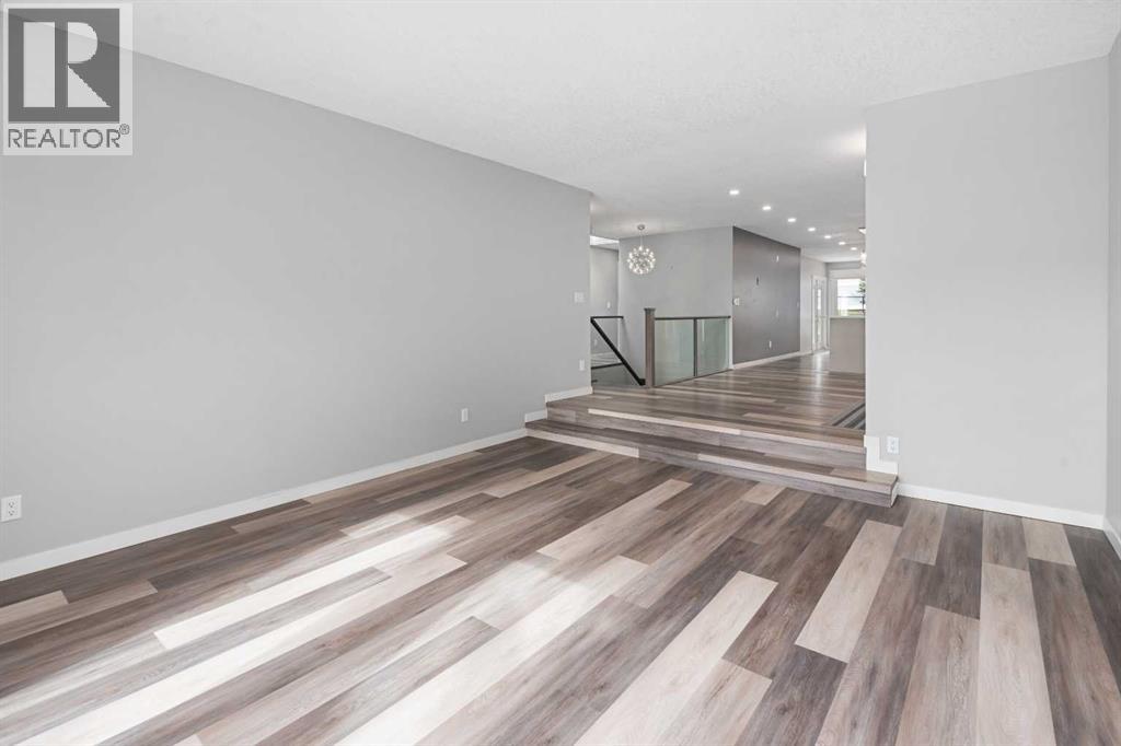 51 Woodmont Road SW, Calgary, Alberta  T2W 4L6 - Photo 5 - A2324229