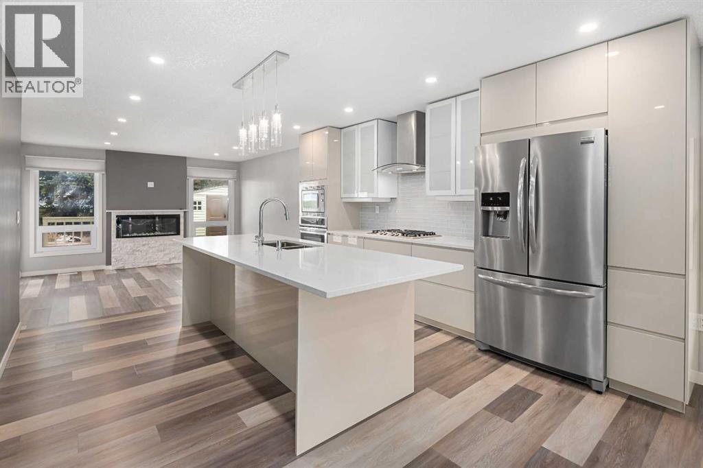 51 Woodmont Road SW, Calgary, Alberta  T2W 4L6 - Photo 10 - A2324229