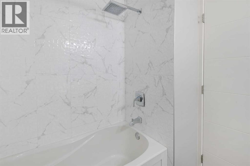 51 Woodmont Road SW, Calgary, Alberta  T2W 4L6 - Photo 21 - A2324229