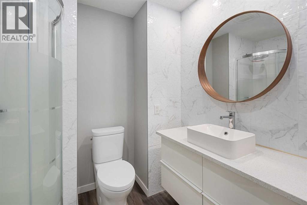 51 Woodmont Road SW, Calgary, Alberta  T2W 4L6 - Photo 25 - A2324229