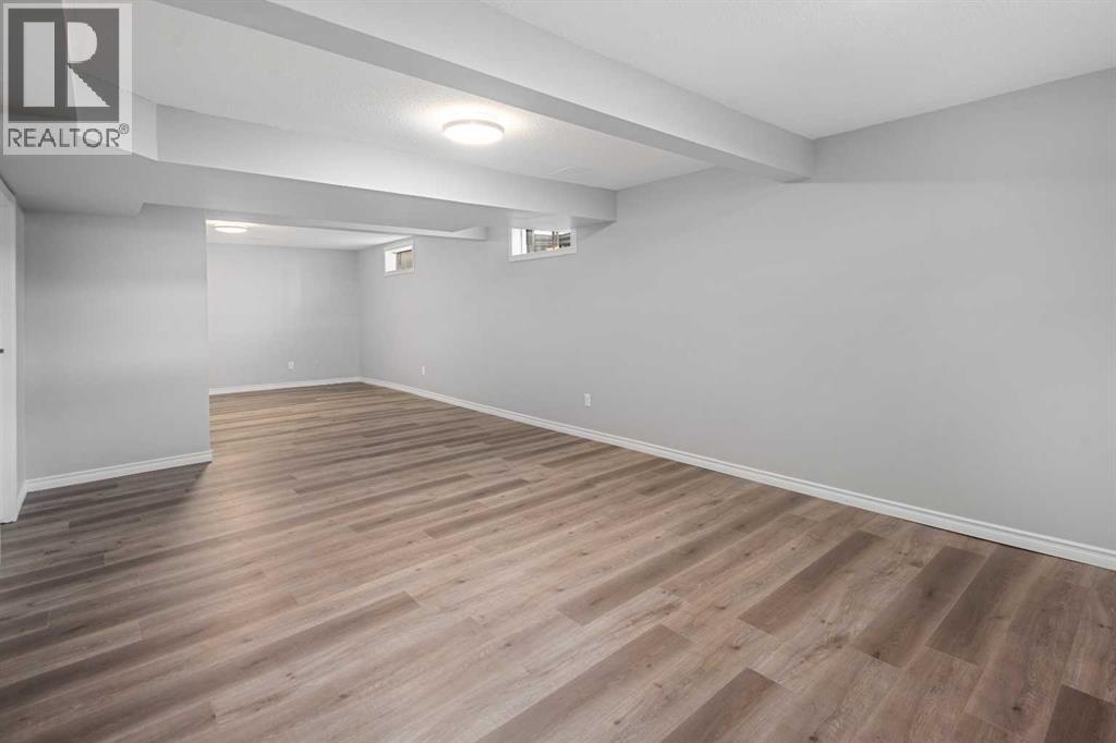 51 Woodmont Road SW, Calgary, Alberta  T2W 4L6 - Photo 37 - A2324229