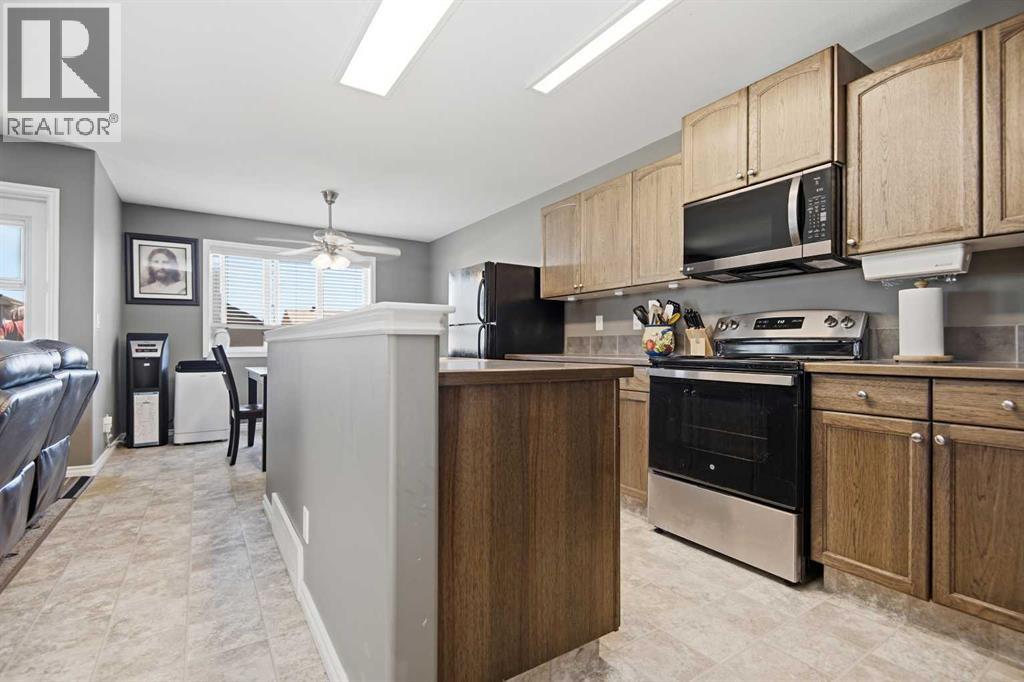 56 Heron Court, Penhold, Alberta  T4G 0G5 - Photo 5 - A2327483