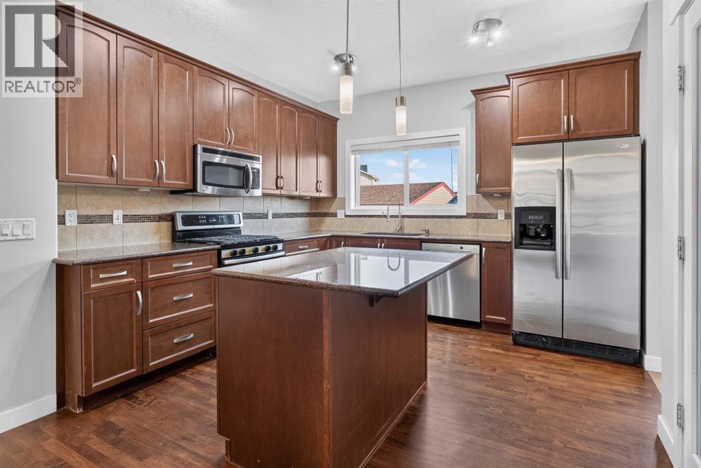22 Panora Road NW, Calgary, Alberta  T3K 0R4 - Photo 11 - A2334301