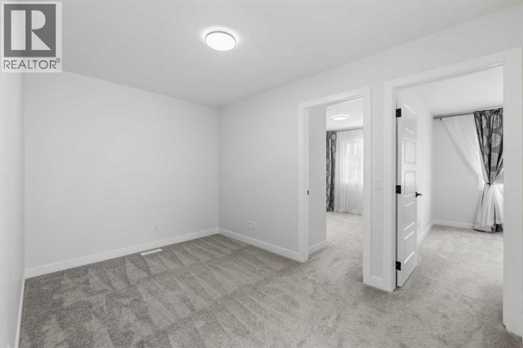 150 Ambleton Drive NW, Calgary, Alberta  T3P 1W6 - Photo 24 - A2322633
