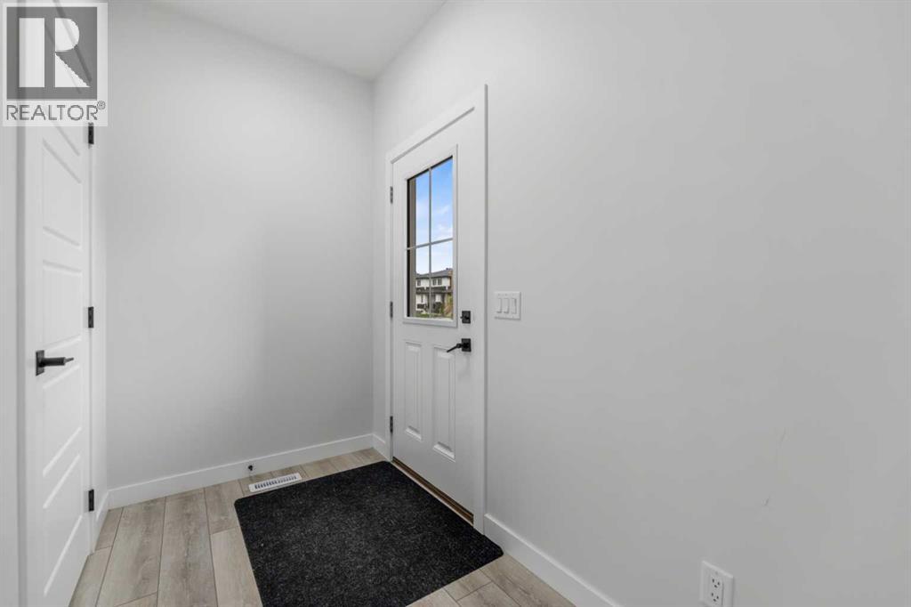 150 Ambleton Drive NW, Calgary, Alberta  T3P 1W6 - Photo 5 - A2322633