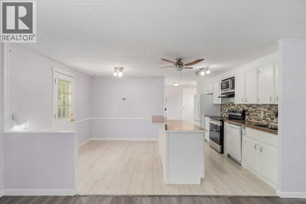 34 Burroughs Place NE, Calgary, Alberta  T1Y 6K5 - Photo 3 - A2333798