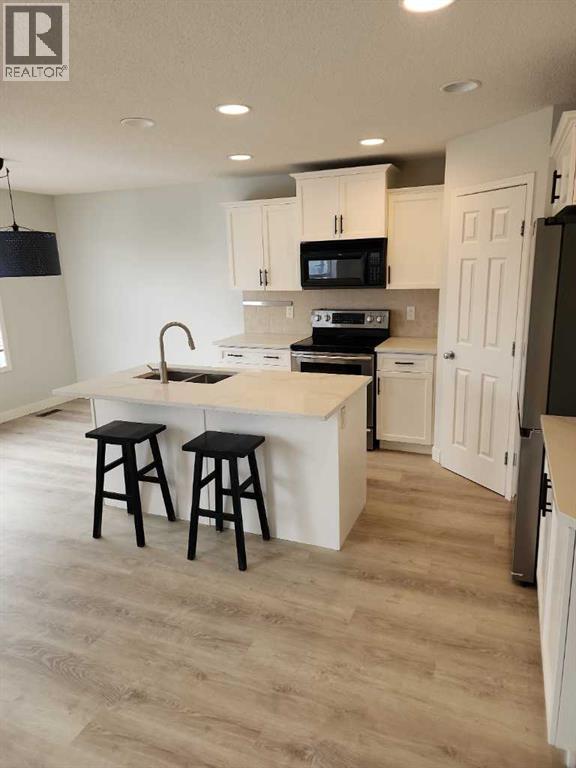 15 Tuscany Reserve Bay NW, Calgary, Alberta  T3L 0A9 - Photo 4 - A2334423