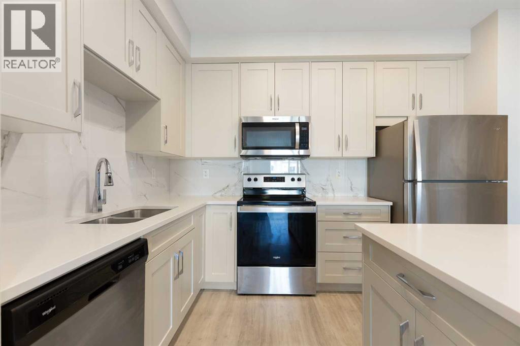 202, 150 Shawnee Square SW, Calgary, Alberta  T2Y 0T6 - Photo 2 - A2334729