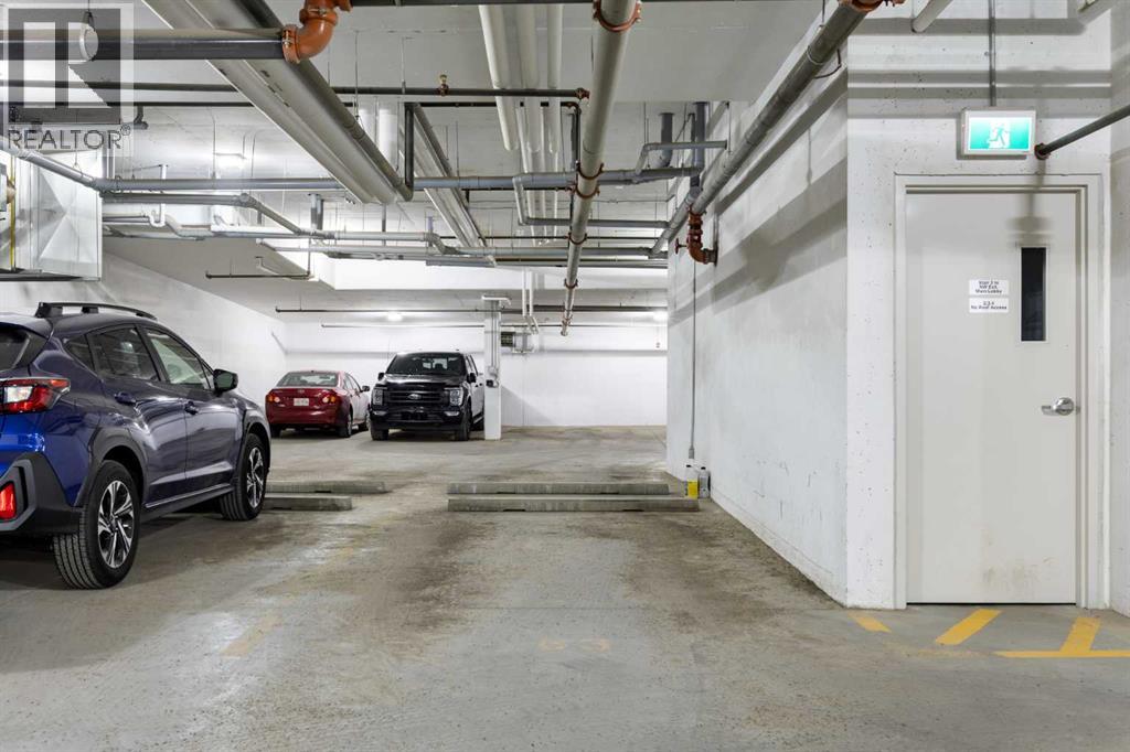 202, 150 Shawnee Square SW, Calgary, Alberta  T2Y 0T6 - Photo 30 - A2334729