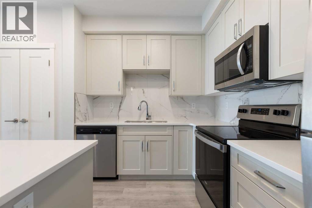 202, 150 Shawnee Square SW, Calgary, Alberta  T2Y 0T6 - Photo 4 - A2334729