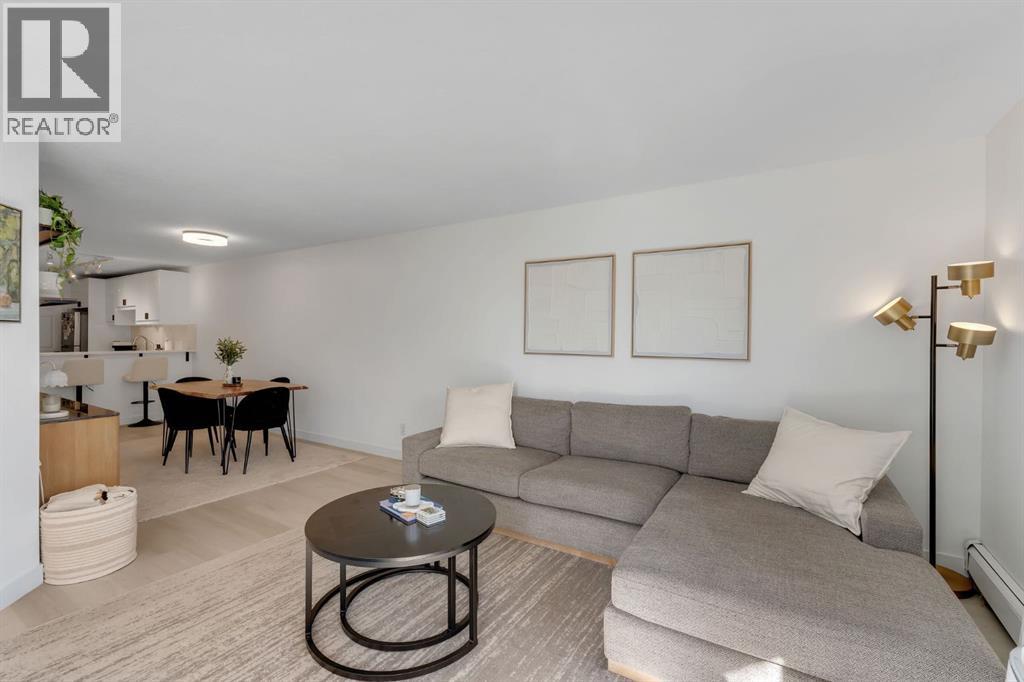 302, 705 56 Avenue SW, Calgary, Alberta  T2V 0G9 - Photo 2 - A2329925