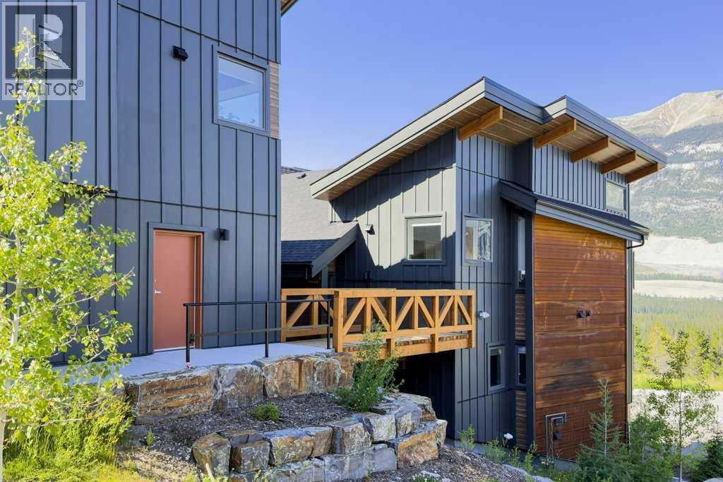 202m, 209 Stewart Creek Rise, Canmore, Alberta  T1W 0N9 - Photo 3 - A2327279