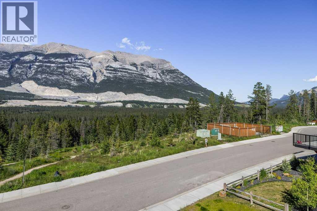 202m, 209 Stewart Creek Rise, Canmore, Alberta  T1W 0N9 - Photo 30 - A2327279