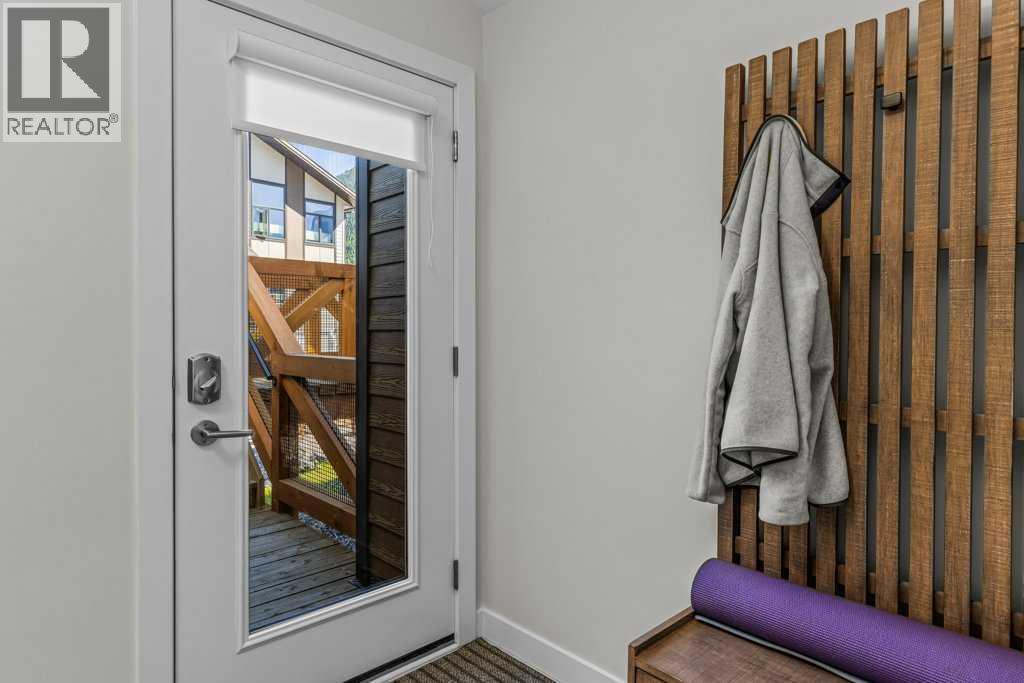 202m, 209 Stewart Creek Rise, Canmore, Alberta  T1W 0N9 - Photo 5 - A2327279