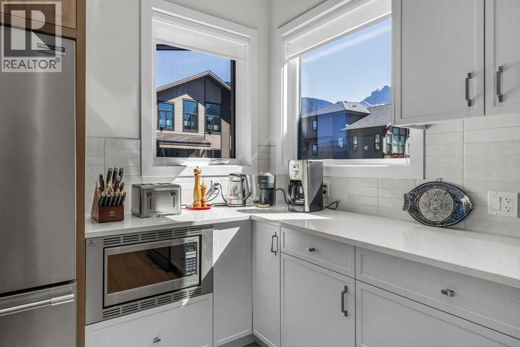202m, 209 Stewart Creek Rise, Canmore, Alberta  T1W 0N9 - Photo 14 - A2327279