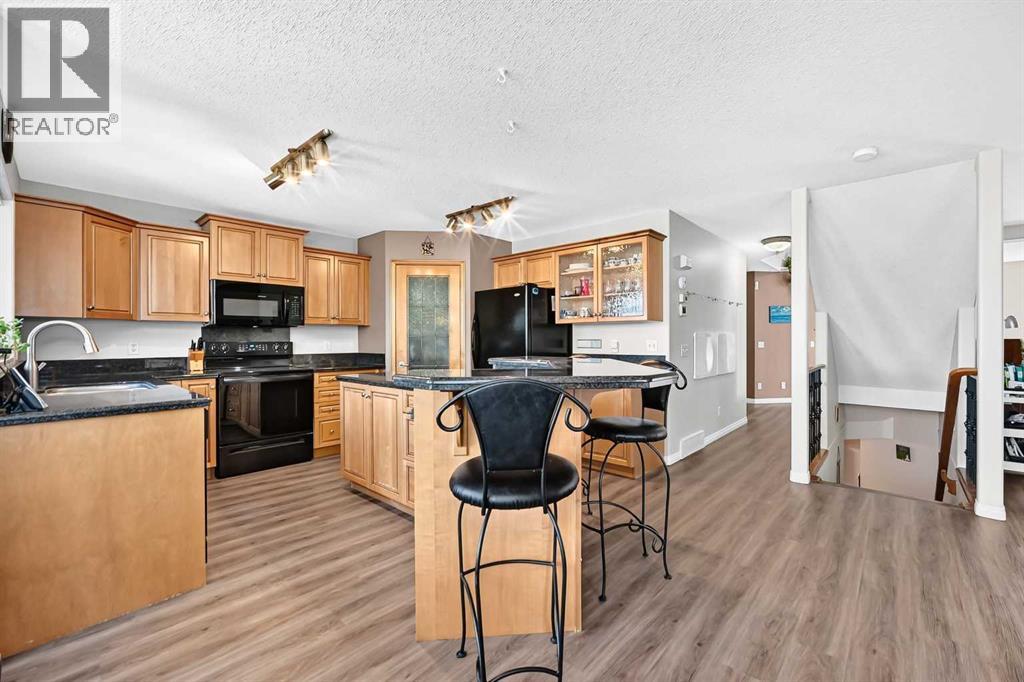 60 Harvest Park Way, Calgary, Alberta  T3K 4K7 - Photo 6 - A2334803