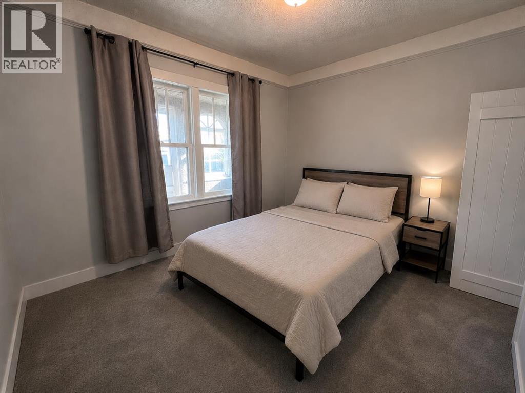 5003 55 Ave, Ponoka, Alberta  T4J 1H3 - Photo 8 - A2322139