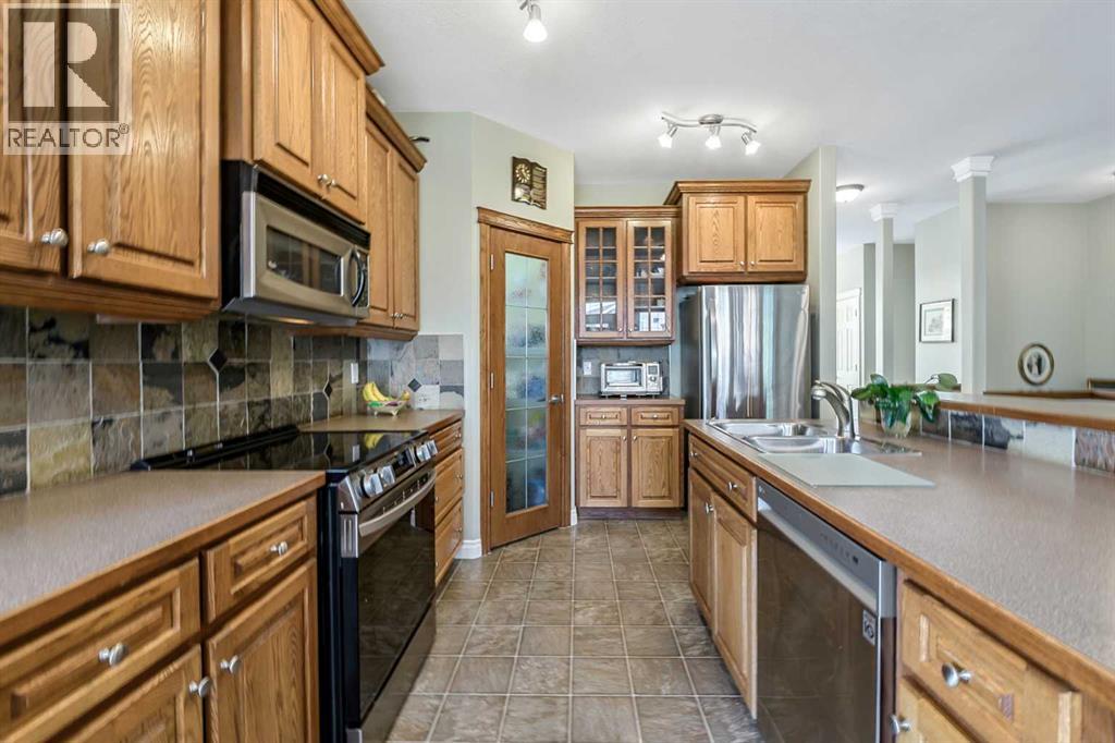 14 Cimarron Park Cove, Okotoks, Alberta  T1S 2L8 - Photo 8 - A2326528