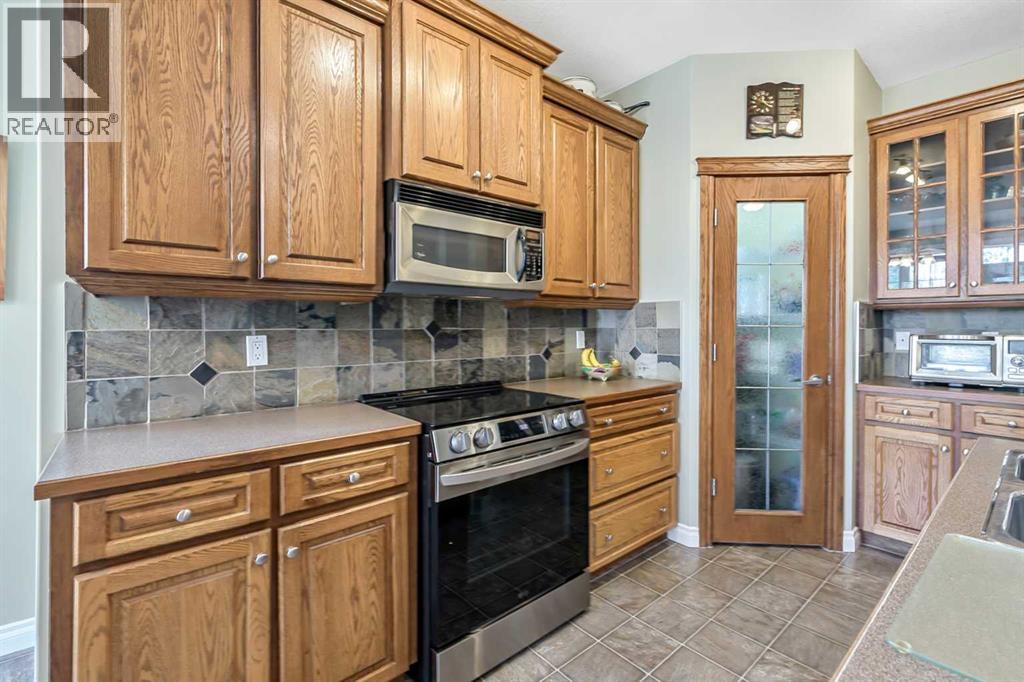 14 Cimarron Park Cove, Okotoks, Alberta  T1S 2L8 - Photo 7 - A2326528