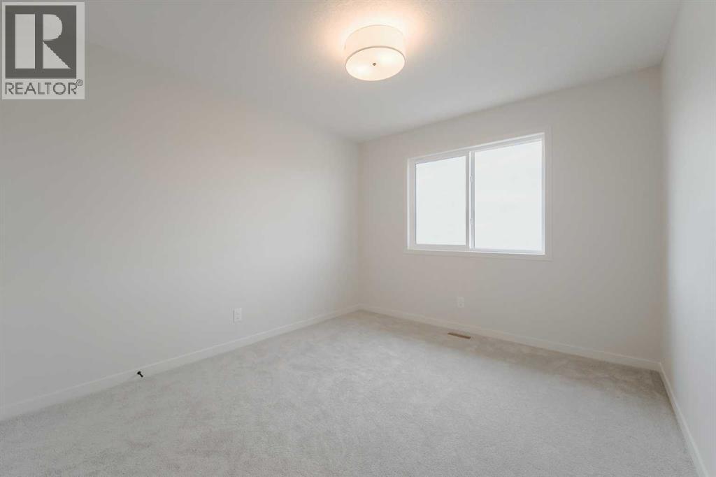 96 Fireside Common, Cochrane, Alberta  T4C 3J1 - Photo 35 - A2330775