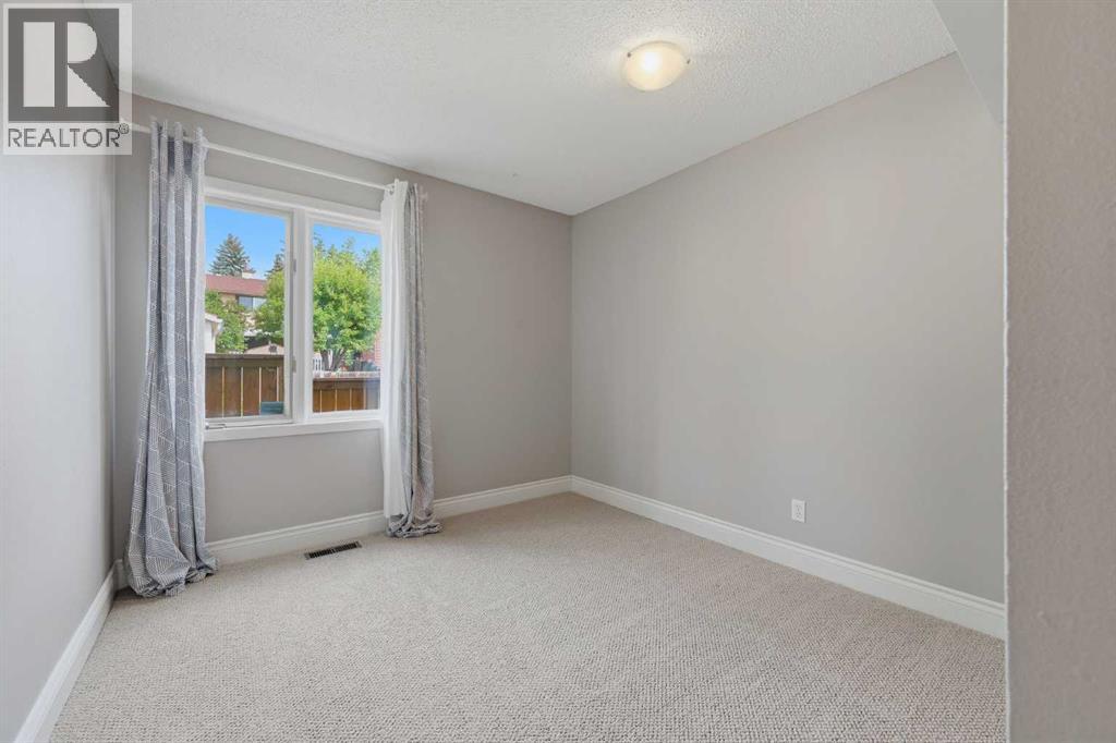 111 Coachwood Crescent SW, Calgary, Alberta  T3H 1C2 - Photo 22 - A2335109