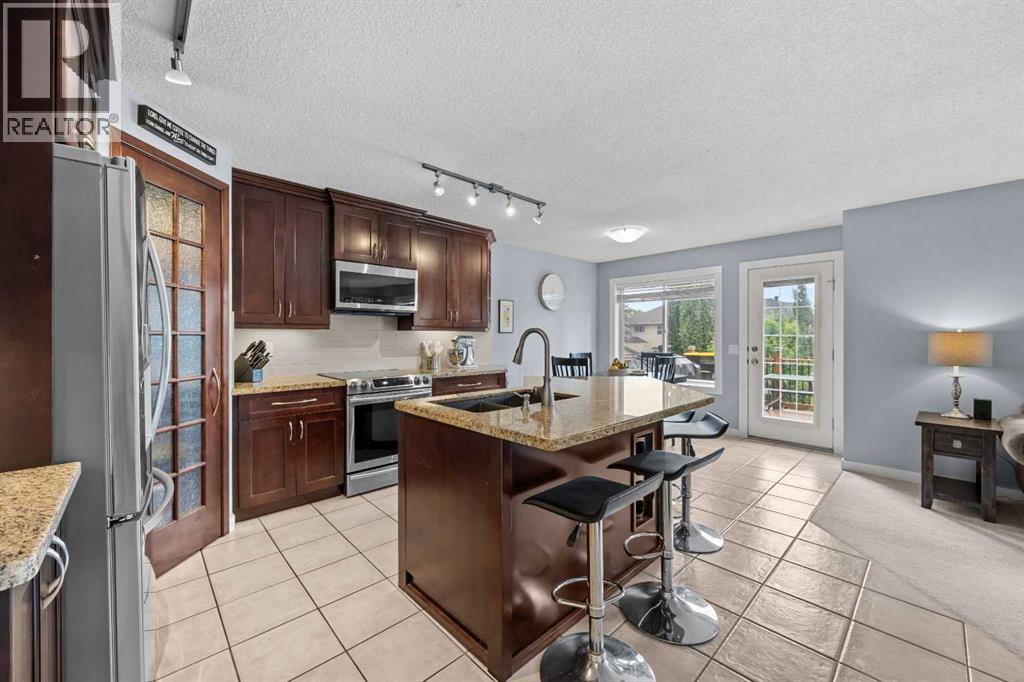 109 Hidden Valley Grove NW, Calgary, Alberta  T3A 5W8 - Photo 6 - A2329265