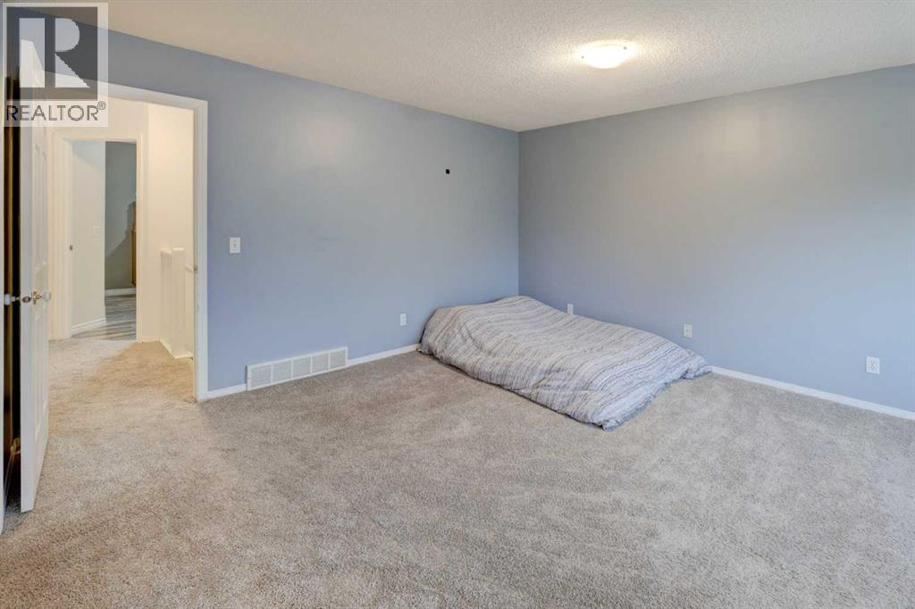 215 Arbour Ridge Way NW, Calgary, Alberta  T3G 3Z3 - Photo 19 - A2334298