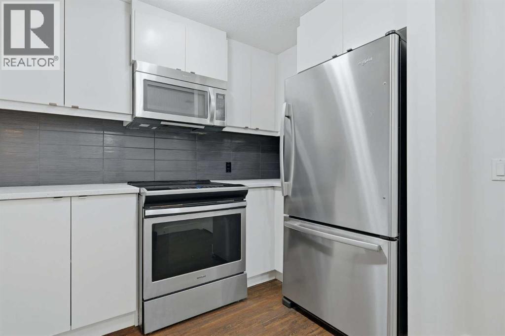 306, 25 Aspenmont Heights SW, Calgary, Alberta  T3H 0E4 - Photo 5 - A2319962