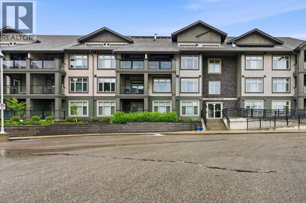 306, 25 Aspenmont Heights SW, Calgary, Alberta  T3H 0E4 - Photo 1 - A2319962