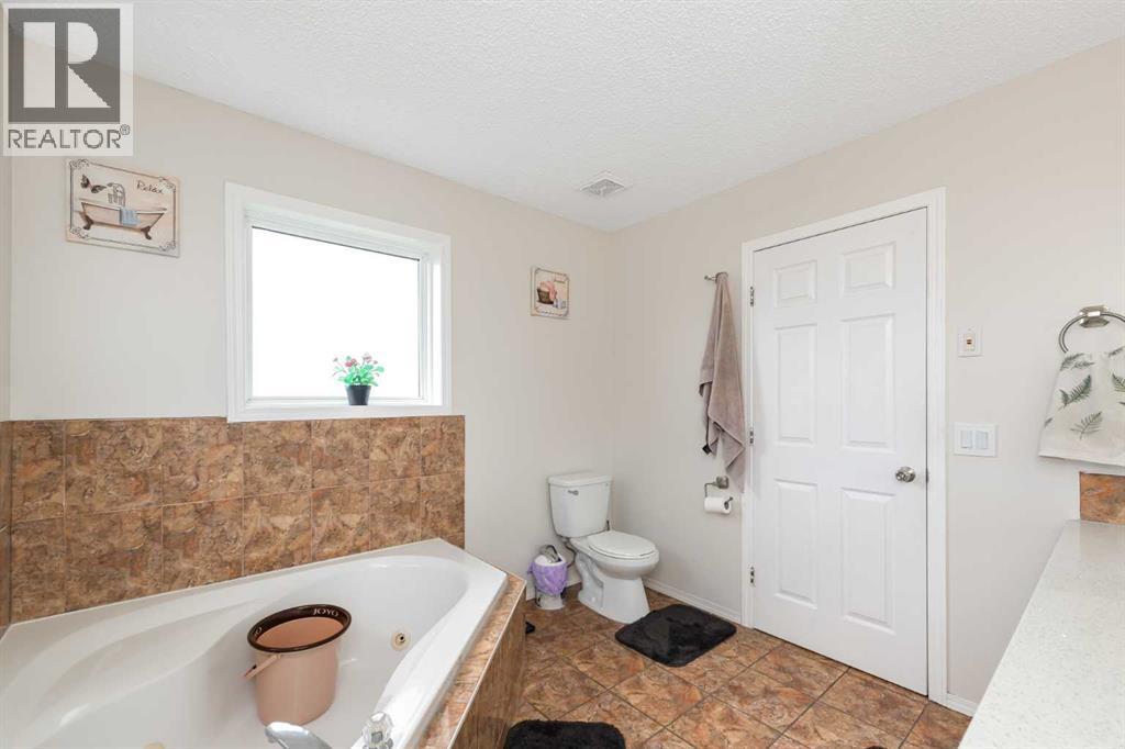 210 Taracove Landing NE, Calgary, Alberta  T3J 4R5 - Photo 20 - A2334351