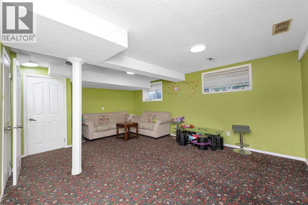 210 Taracove Landing NE, Calgary, Alberta  T3J 4R5 - Photo 27 - A2334351