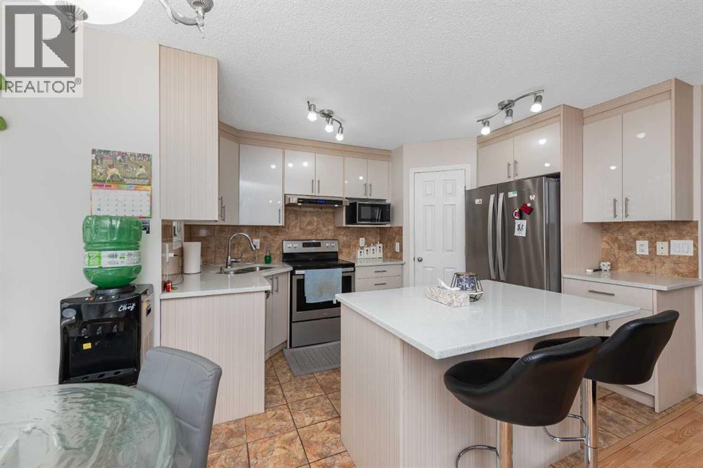 210 Taracove Landing NE, Calgary, Alberta  T3J 4R5 - Photo 7 - A2334351