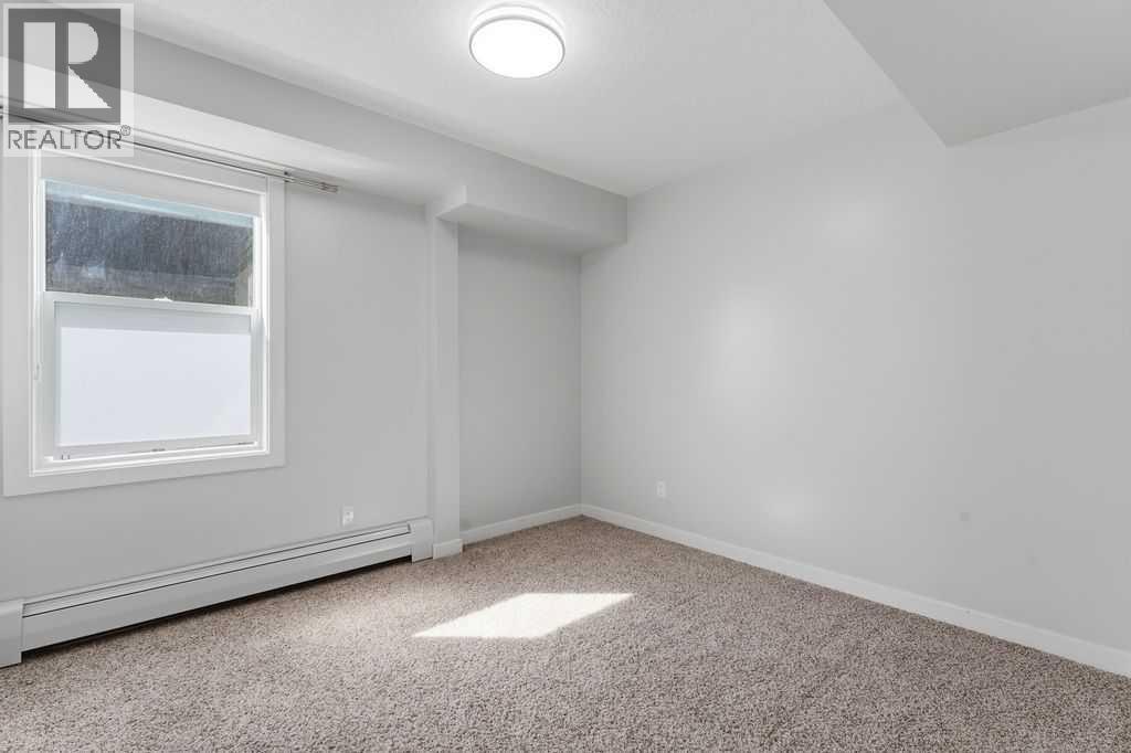 208, 15207 1 Street SE, Calgary, Alberta  T2X 2A2 - Photo 20 - A2322303