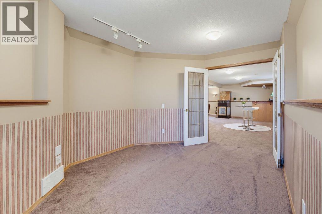 359 Hidden Ranch Place NW, Calgary, Alberta  T3A 5N7 - Photo 29 - A2329869