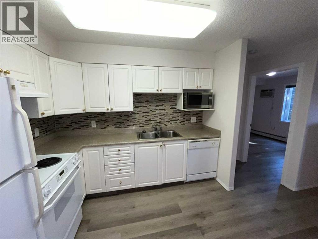 3120, 3120 Millrise Point SW, Calgary, Alberta  T2W 3W4 - Photo 4 - A2332430