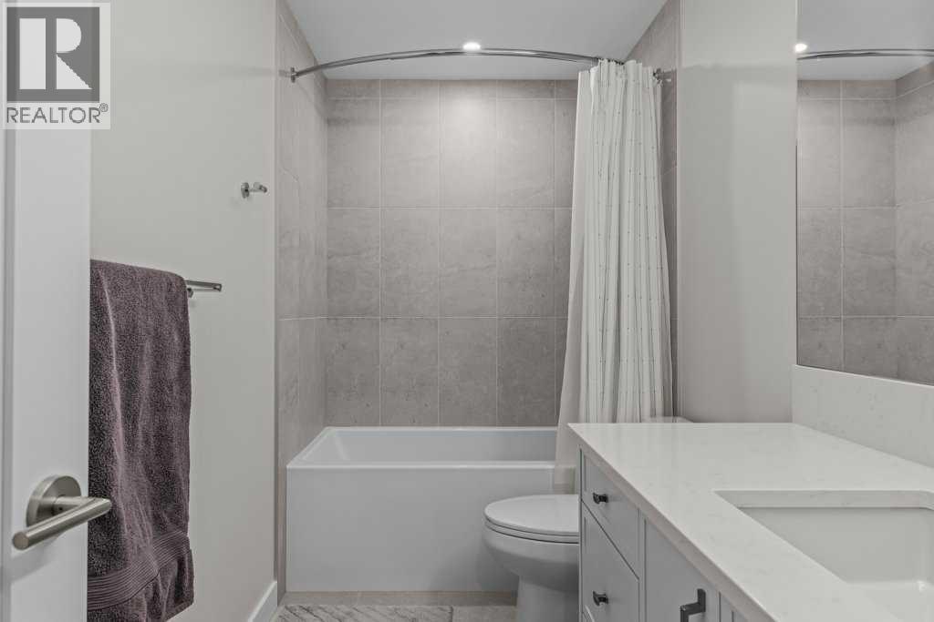 202m, 209 Stewart Creek Rise, Canmore, Alberta  T1W 0N9 - Photo 34 - A2327279