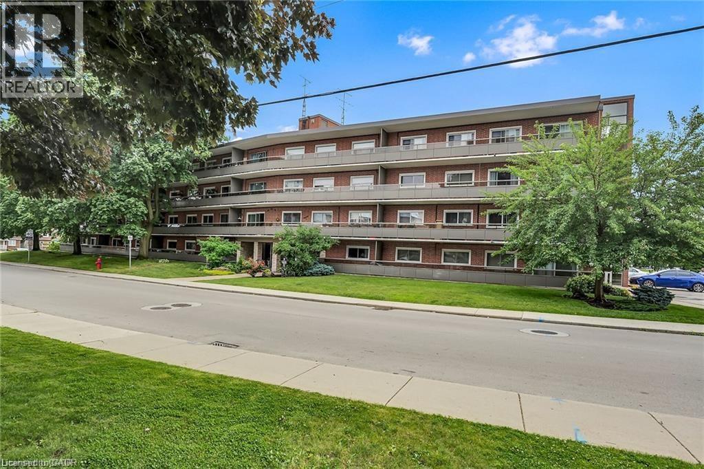 11 Woodman Drive Unit# 409, Hamilton, Ontario  L8K 4E3 - Photo 1 - 40853751