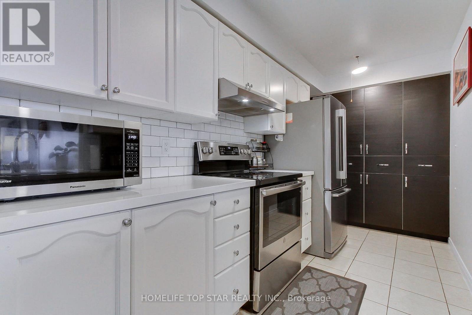 1323 - 18 Mondeo Drive, Toronto, Ontario  M1P 5C8 - Photo 7 - E13640326
