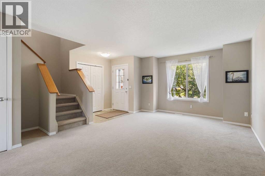 49 Evermeadow Manor SW, Calgary, Alberta  T2Y 4W8 - Photo 6 - A2332494