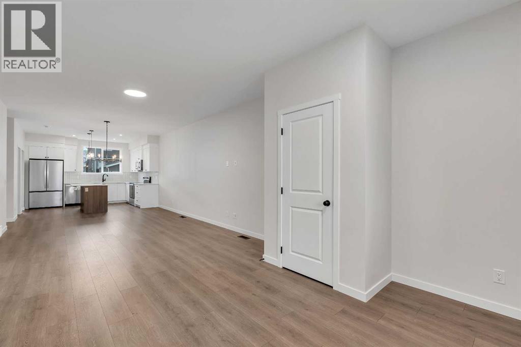 50 Creekview Gardens SW, Calgary, Alberta  T2X 4Y1 - Photo 7 - A2316512