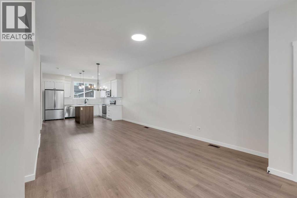 50 Creekview Gardens SW, Calgary, Alberta  T2X 4Y1 - Photo 5 - A2316512