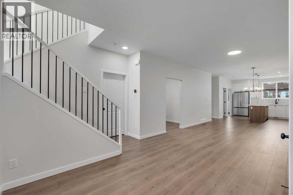 50 Creekview Gardens SW, Calgary, Alberta  T2X 4Y1 - Photo 6 - A2316512