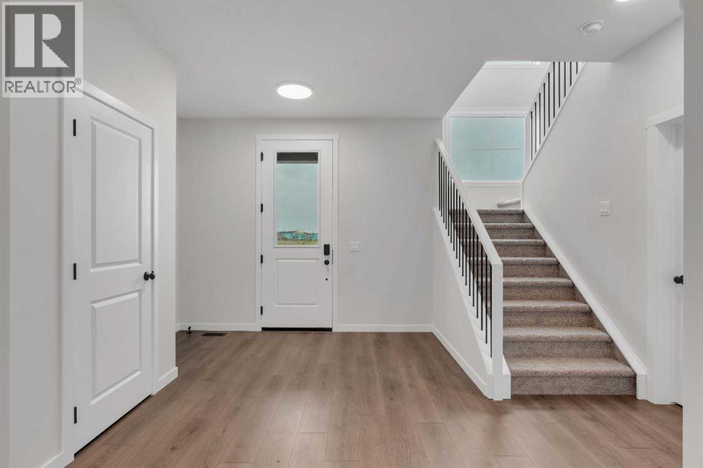 50 Creekview Gardens SW, Calgary, Alberta  T2X 4Y1 - Photo 2 - A2316512