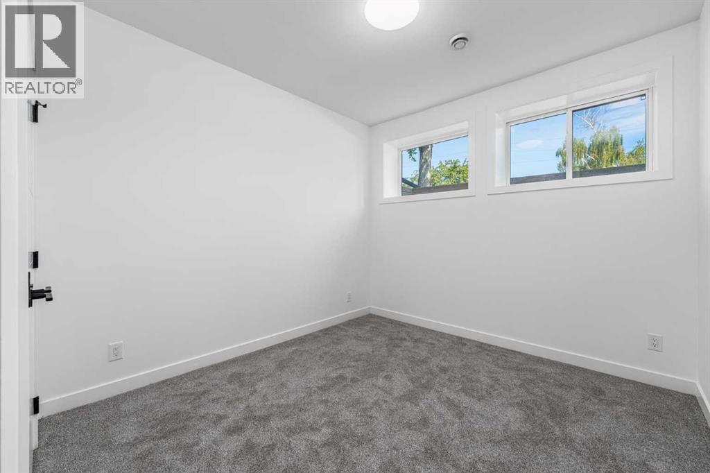 421 Hendon Drive NW, Calgary, Alberta  T2K 2A1 - Photo 29 - A2331201